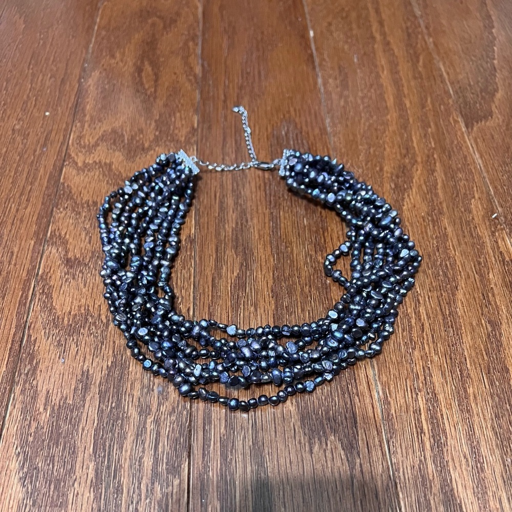 Purple / mother of pearl colored layered bead necklace